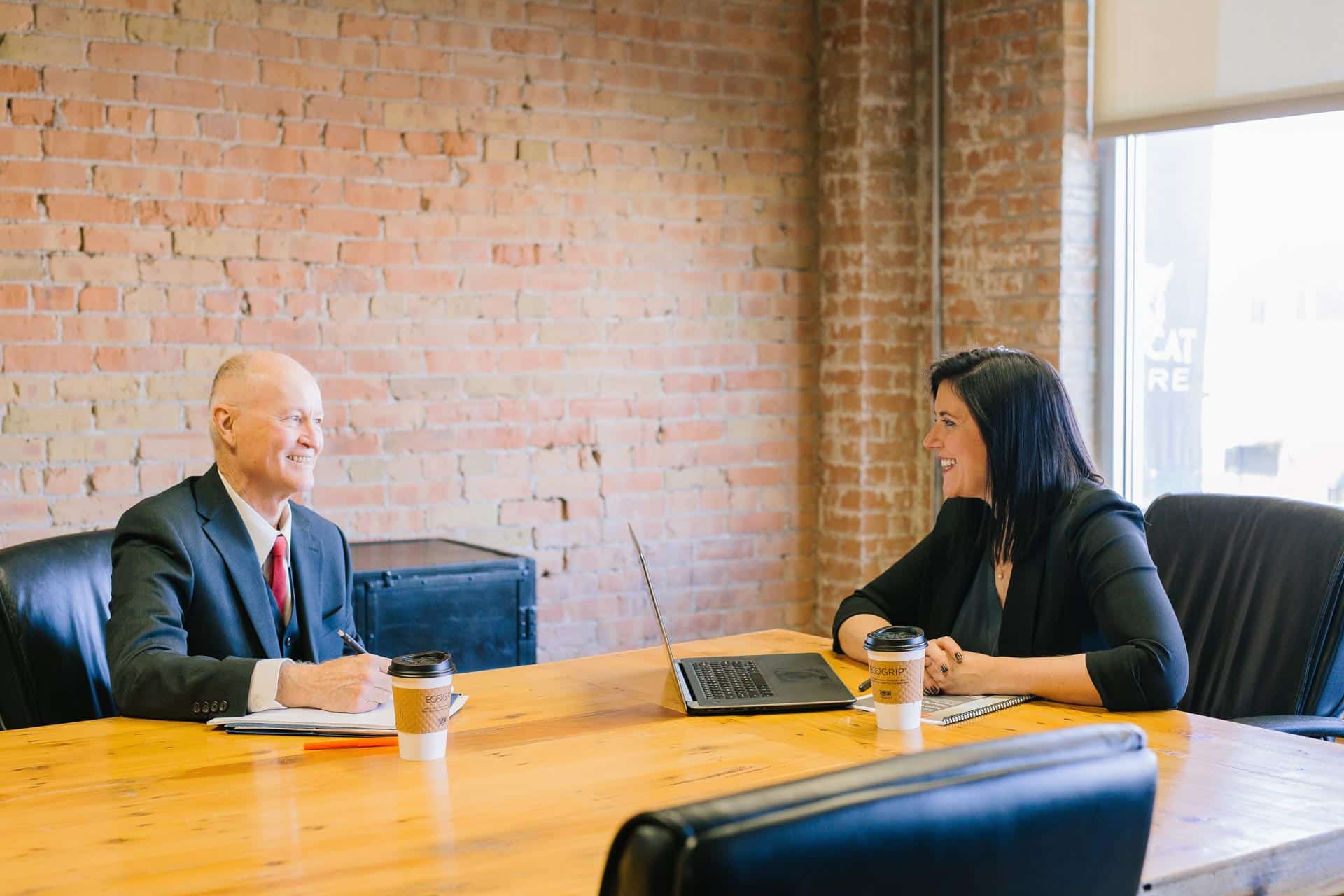 man and woman in business meeting