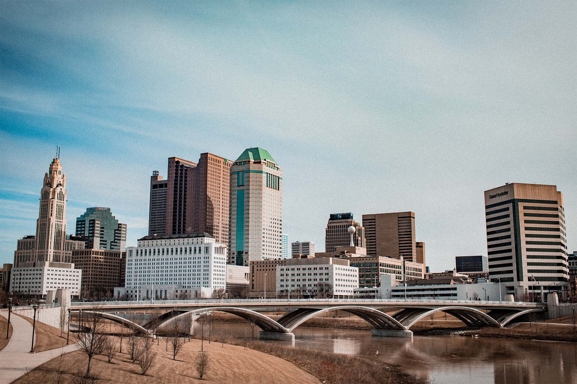 city skyline with a bridge